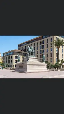 a statue in front of a large building at Ajaccio appartement vielle ville - 4 personnes in Ajaccio
