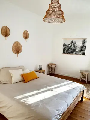 a bedroom with a large bed in a room at Appartement au cœur de Sartene in Sartène