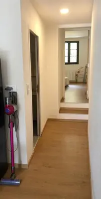 a hallway of a home with a room with a hallway at Maison au centre d'un village typique in Omessa