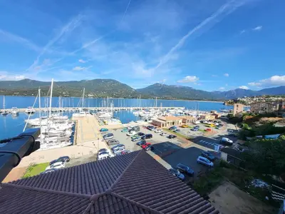 a marina with a bunch of boats in the water at Location appartement propriano in Propriano