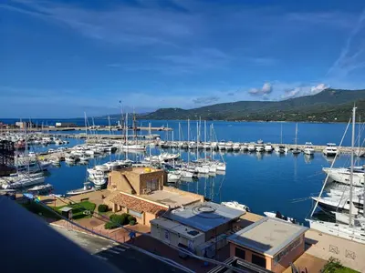 a marina with lots of boats in the water at Location appartement propriano in Propriano