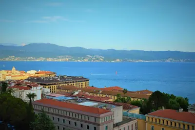 a view of a city with the water and buildings at Grand T2 STANDING AJACCIO Proche centre et plages VUE PANORAMIQUE PARKING PRIVE in Ajaccio