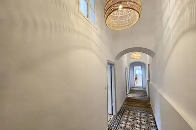 a hallway of a home with a hallway at Cargèse, appartement de charme surplombant le port in Cargèse