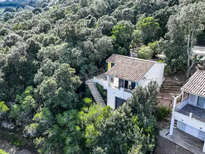 an aerial view of a house in the woods at Holiday Home Pietralunga-1 by Interhome in Sotta