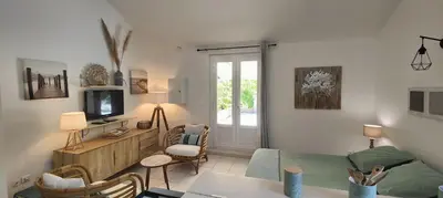 a living room with a couch and a tv at U Caseddu 