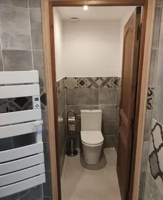 a small bathroom with a toilet in a room at Chambres d’hôtes Casarena in Porto-Vecchio