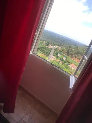a window in a room with a view at A Balamata in Cervione