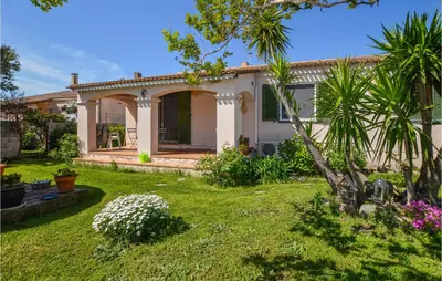 a house with a garden in front of it at Amazing Home In Borgo With Kitchen in Borgo