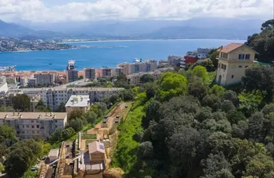 an aerial view of a city and a body of water at VILLA BELVEDERE D'AJACCIO, VILLA ENTIERE VUE MER POUR 2 à 10 VOYAGEURS in Ajaccio