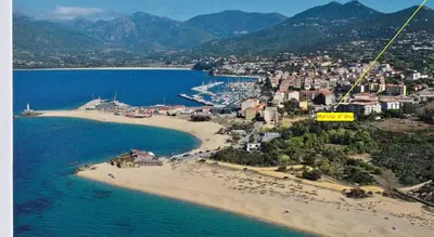 an aerial view of a beach near the water at Marina d'Oro in Propriano
