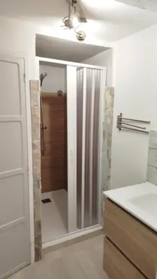 a bathroom with a shower and a sink at T2 type new yorkais in Ajaccio