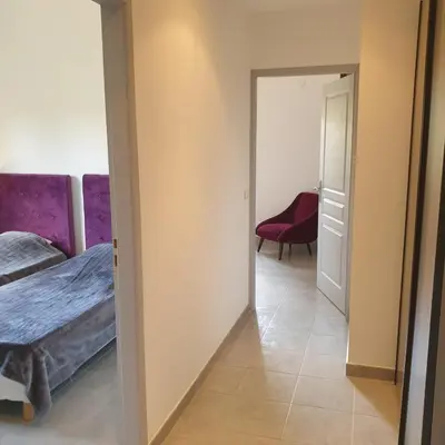 a bathroom with a shower with a shower curtain at Villa Salute 6 pers 5 min plage en voiture in Porto-Vecchio
