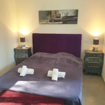 a room with a door and a hallway with a mirror at Villa Salute 6 pers 5 min plage en voiture in Porto-Vecchio
