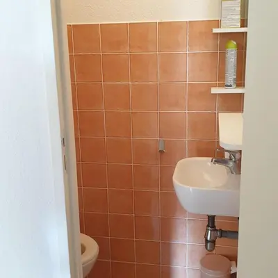 a bathroom with a sink and a toilet at Mini villa Messicana 5 pers piscine 500 m plage in Lecci