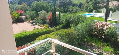 a garden with flowers and plants on a balcony at Lecci St Cyprien Don Andria in Porto-Vecchio