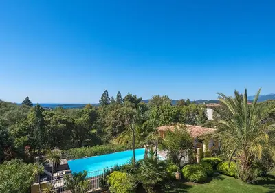 an aerial view of a resort with a swimming pool at Villa RUSCANA AVEC PISCINE PRIVÉE in Sainte-Lucie de Porto-Vecchio