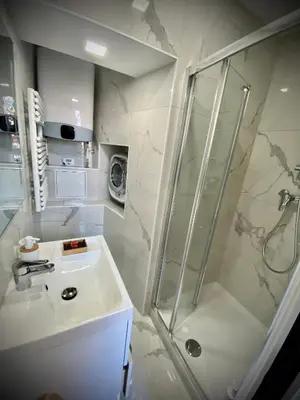 a bathroom with a shower and a sink at Suite Letizia in Ajaccio