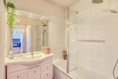 a bathroom with a sink and a shower and a tub at Cappella in Ajaccio