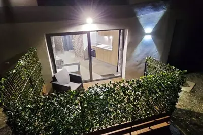 an overhead view of a living room with a large window at Corse et Zen BULLE ZEN 25 m² 2 pers + Bébé in Folelli