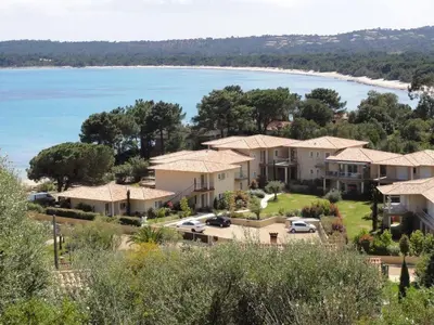 an aerial view of a resort with a beach at La corse les pieds dans l'eau in Sainte-Lucie de Porto-Vecchio