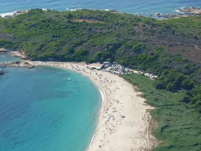 an aerial view of a beach with a bunch of people at CAMPING U SOMMALU in Casaglione
