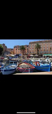 a group of boats are parked in a harbor at Ajaccio Magnifique T2 45m2 neuf 5 personnes Clim wifi stationnement gratuit centre ville plage à 300m in Ajaccio