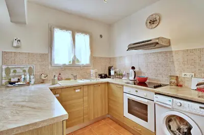 a kitchen with a sink and a dishwasher at Appartement T2 Prunello By Intendance Excellency in Porto-Vecchio