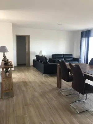 a living room with a couch and a table at Mare e Monti in Aléria