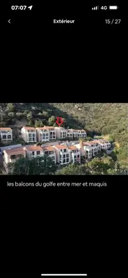 a screenshot of a website with a picture of a building at Duplex F4-2 balcons face a la mer in Ajaccio