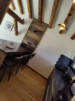 an overhead view of a room with a table and a stove at Résidence Licciola in Propriano