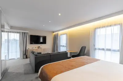 a bathroom with a sink and a shower at Holiday Inn Express Ajaccio by IHG in Ajaccio
