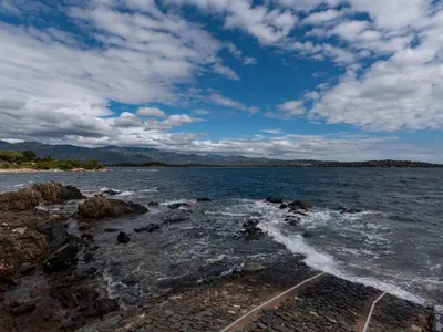 a view of a body of water with waves at Villa Villa Pavellone by Interhome in Porto-Vecchio