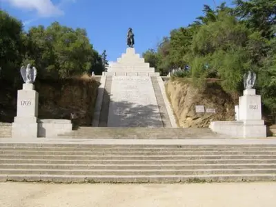 a statue sitting on top of a set of stairs at Studio centre ville in Ajaccio