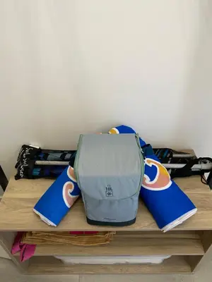 a bag sitting on top of a wooden table at Stella mare à porticcio in Porticcio