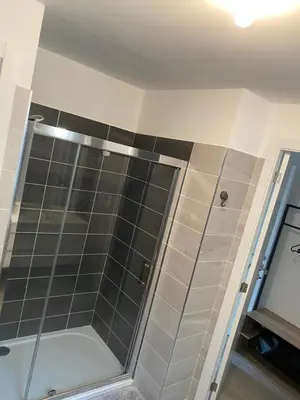 a shower with a glass door in a bathroom at Stella mare à porticcio in Porticcio