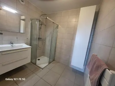 a bathroom with a shower and a sink and a toilet at T2 VUE MER - ENTREE DE VILLE in Ajaccio