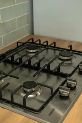 a stove top with four burners on top of it at CASA MONICA CARGESE - Swing 42 - appartement in Cargèse
