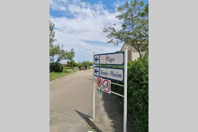 a sign on the side of a road at Studio 4 personnes bord de mer avec piscine wifi in Cervione