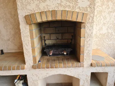 a model of a brick oven in a room at Les Terrasses de Sari in Sari Solenzara