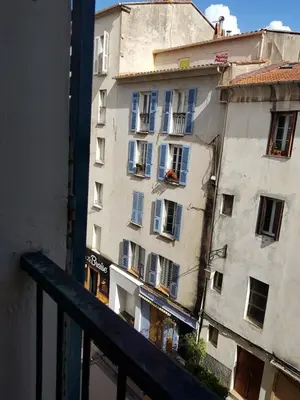 a view of a building from a balcony at AJACCIO CENTRE VIEILLE VILLE IMPÉRIALE TT CONFORT TTES COMMODITÉS 3 a 4 PERs CATHÉDRALE A 300M MER PORT MARCHE LOCAL PLAGES in Ajaccio