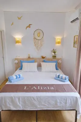 an aerial view of a resort on the water at L'Alizia in Sari Solenzara
