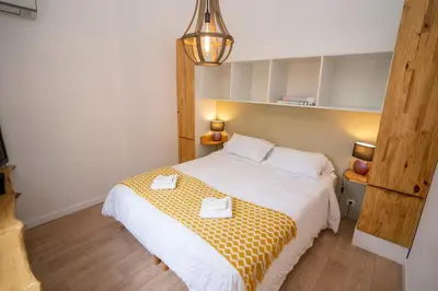 a bedroom with a bed with two towels on it at Casa Cardiccia in Folelli