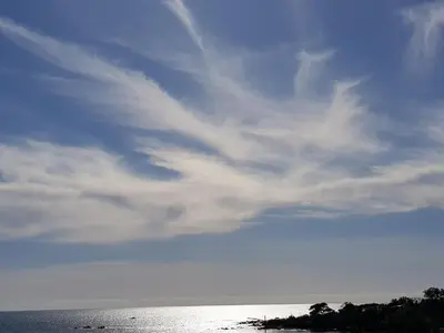 a cloudy sky over a body of water at VIEILLE VILLE D AJACCIO de 1 a 4 PERs A 300M DU PORT ET A 15 MN DE LAEROPORT PROCHES DE PLUS BELLES PLAGES ET TTES COMMODITES A PROXIMITE in Ajaccio
