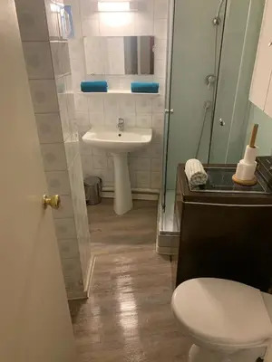 a bathroom with a toilet and a sink at AJACCIO CATHEDRALE AU COEUR DE LA CITEE IMPERIALE POUR 3 a 4 PERS PROCHE DES PLUS BELLES PLAGES ET DE TOUTES COMMODITES PORT A 2MN in Ajaccio