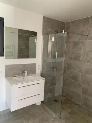 a bathroom with a sink and a shower at DOMAINE NAPOLEON CORSICA FIGARI in Figari