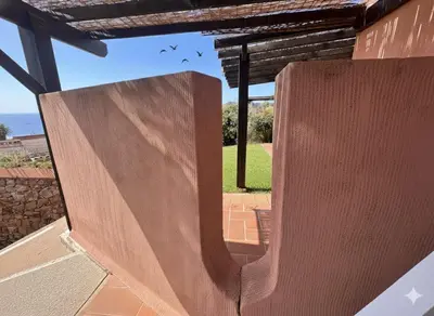 a view from the outside of a house with a slide at 8 ARBOUSIERS VILLA 20 in Bonifacio