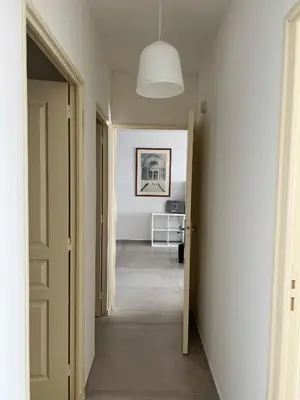 a hallway with a hallway leading into a room at Villa Cargese in Cargèse