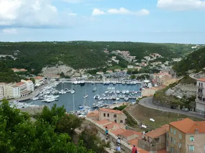 a view of a harbor with boats in the water at Villa Pinarello climatisée avec piscine chauffée in Sainte-Lucie de Porto-Vecchio