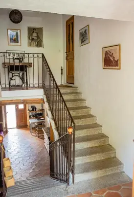 a stairway in a home with a stair case at Auberge U n'Antru Versu in San-Gavino-di-Carbini