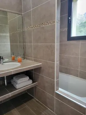 a bathroom with a sink and a shower at Casa San-Ghjuvà in Feliceto